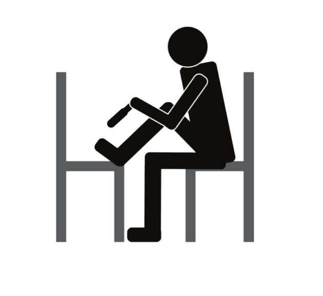 sit on a chair to reach your foot