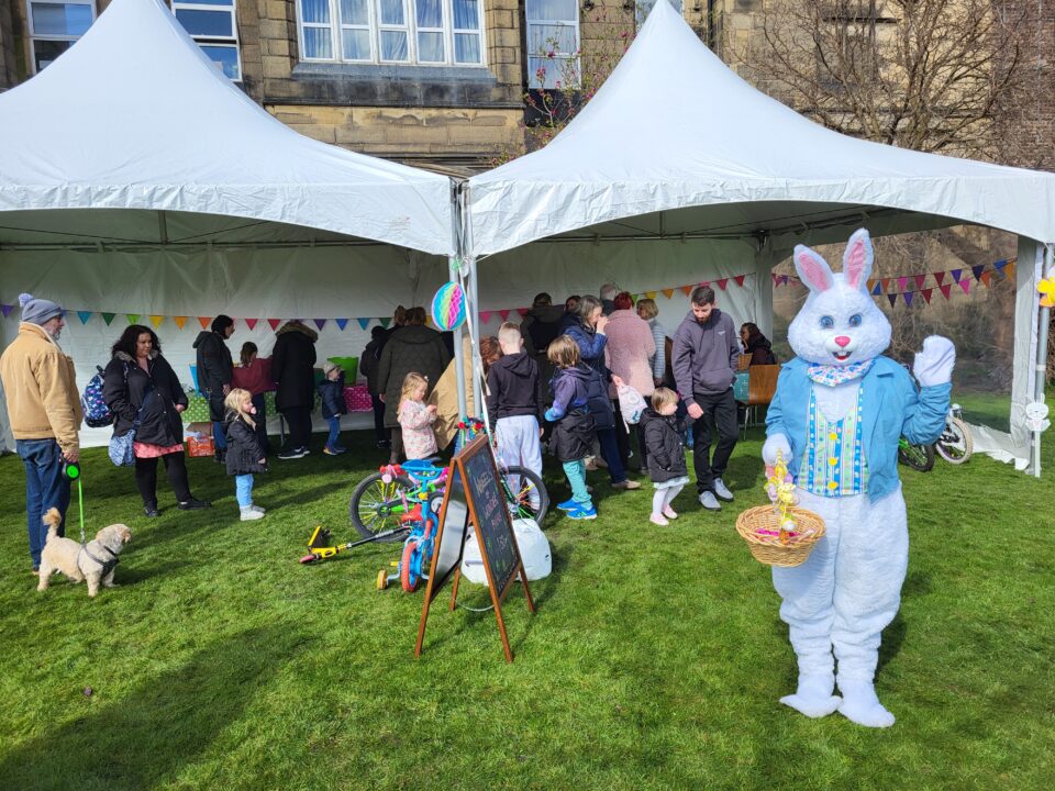 Flourish Easter bunny waving