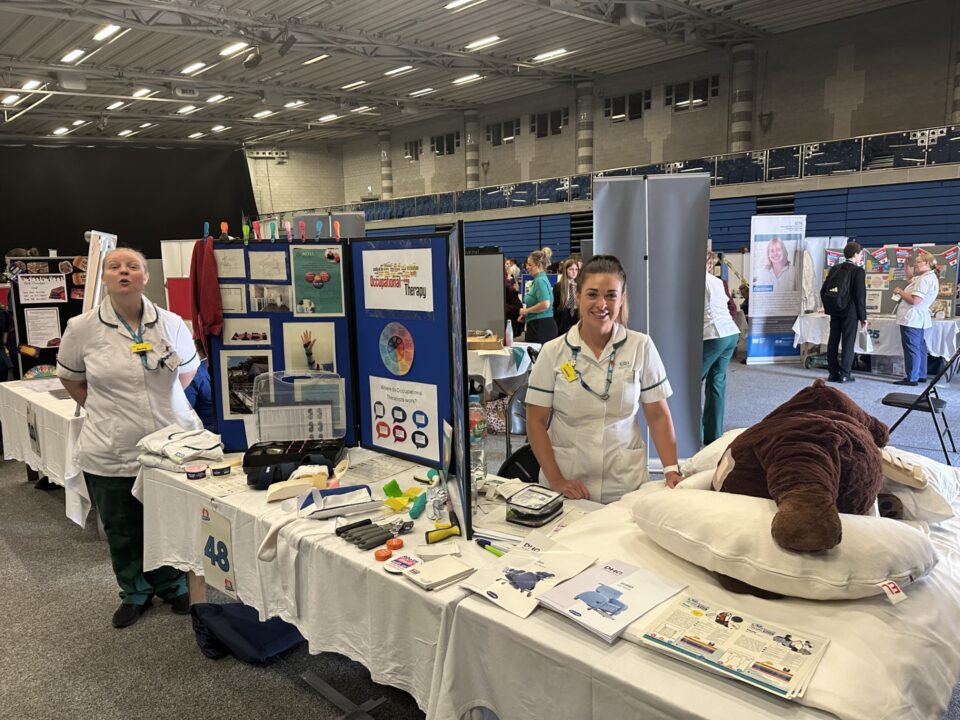 Two people at a stall