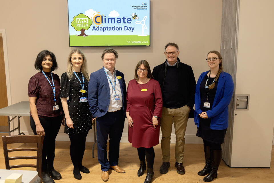 Six people standing at the Climate Adaption Day event