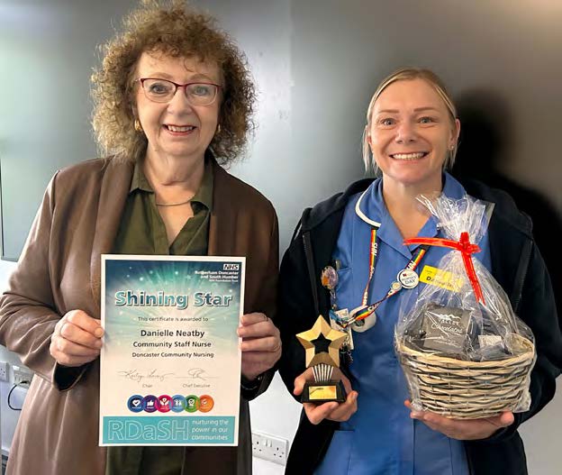 Kathryn Lavery presenting award to Danielle Neatby