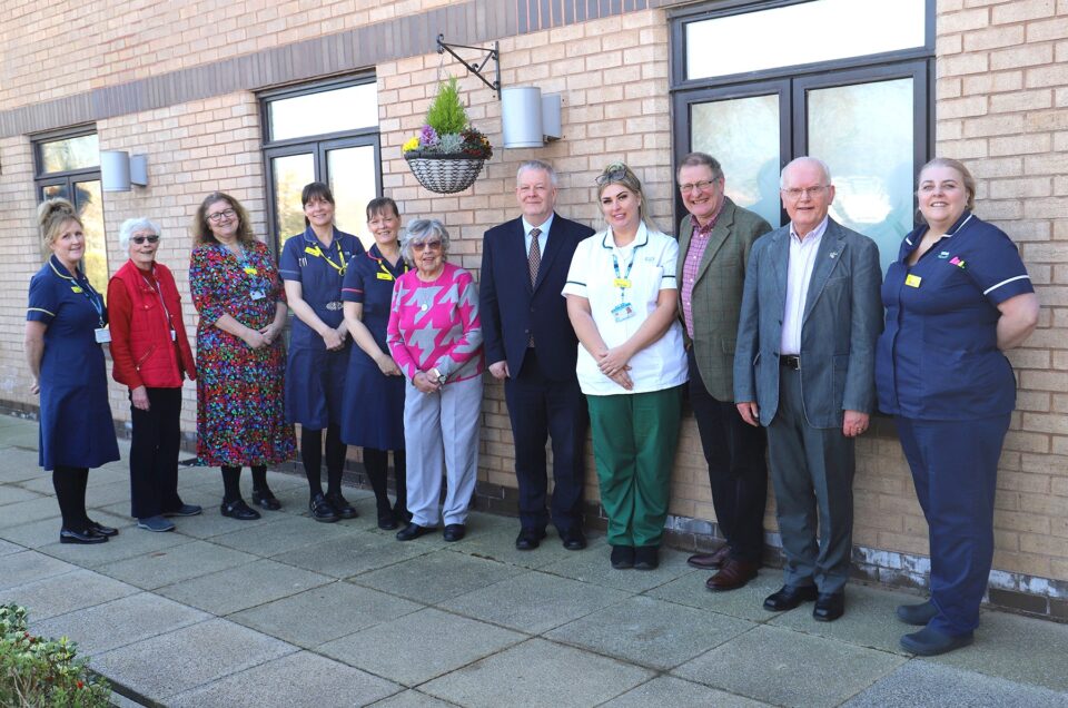 People outside the hospice
