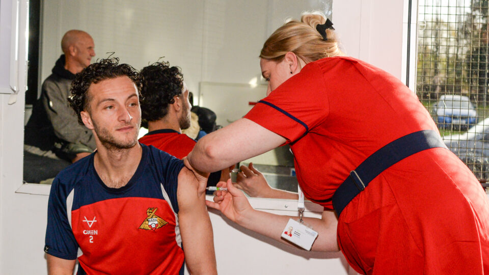 Man getting a flu jab